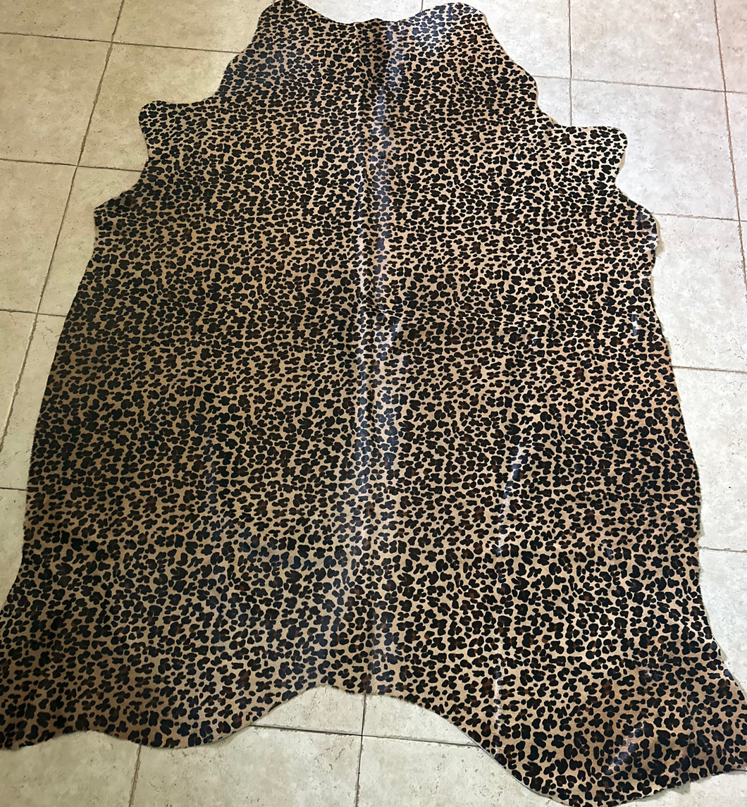 Exotic jaguar printed Brazilian cowhide rug