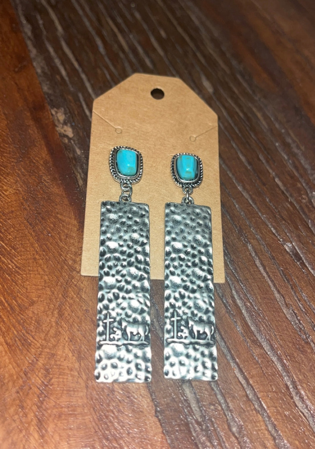 Turquoise praying cowboy earrings