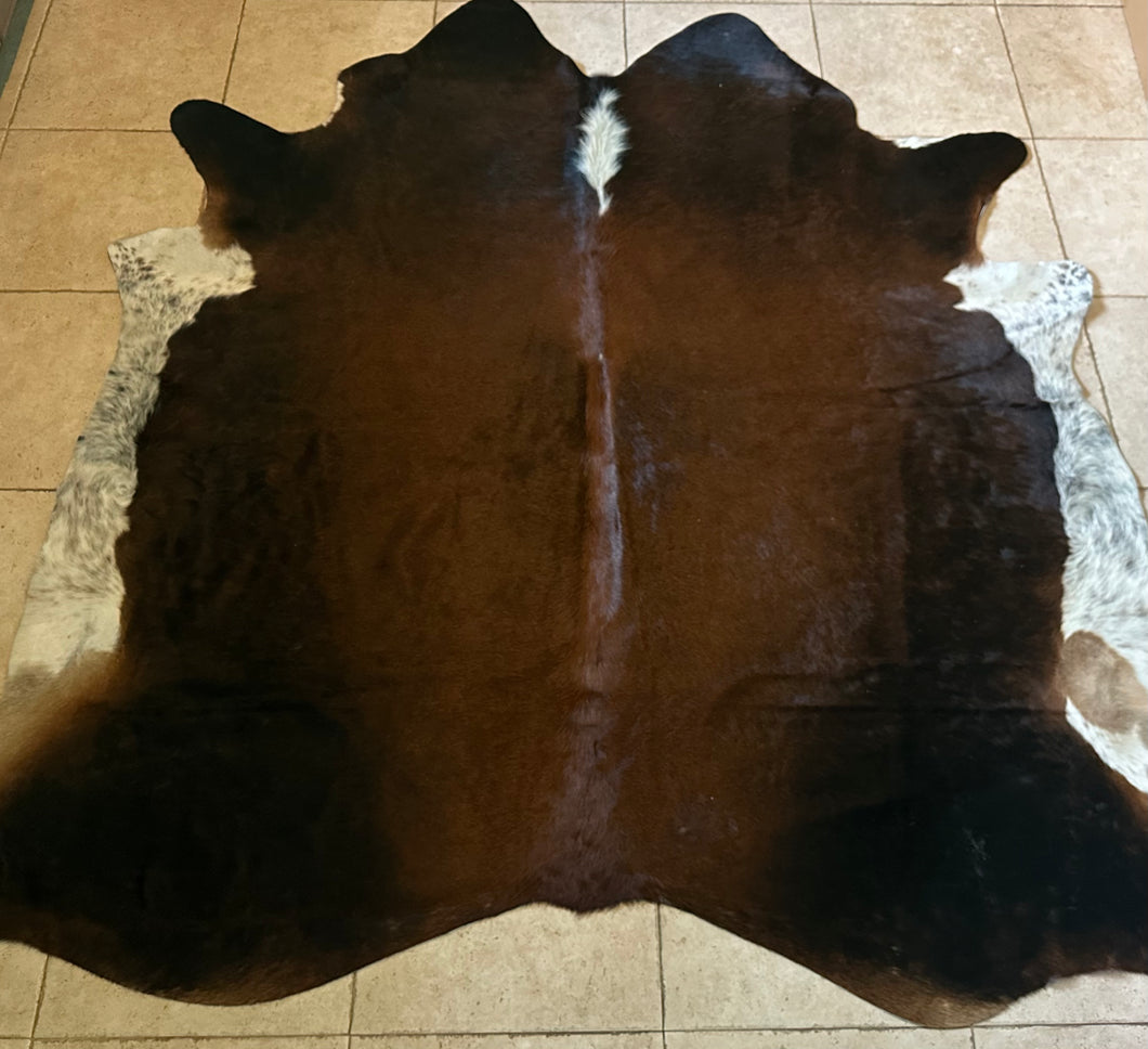 Large tricolor Brazilian cowhide rug