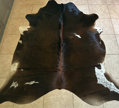 Large tricolor Brazilian cowhide rug